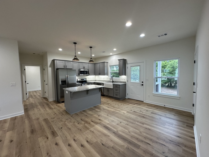 Experience the perfect blend of comfort and functionality in this stunning three-bedroom, two-bathroom home, expertly crafted for today’s families. Enjoy an open-concept floor plan that connects the living room, dining area, and kitchen, making entertaining and everyday living effortless. Each spacious bedroom is filled with natural light, offering a tranquil space to unwind. With 1,348 square feet of thoughtfully designed living space, this home provides style, convenience, and ample room for family life, making it an ideal choice for those seeking modern family homes for sale.