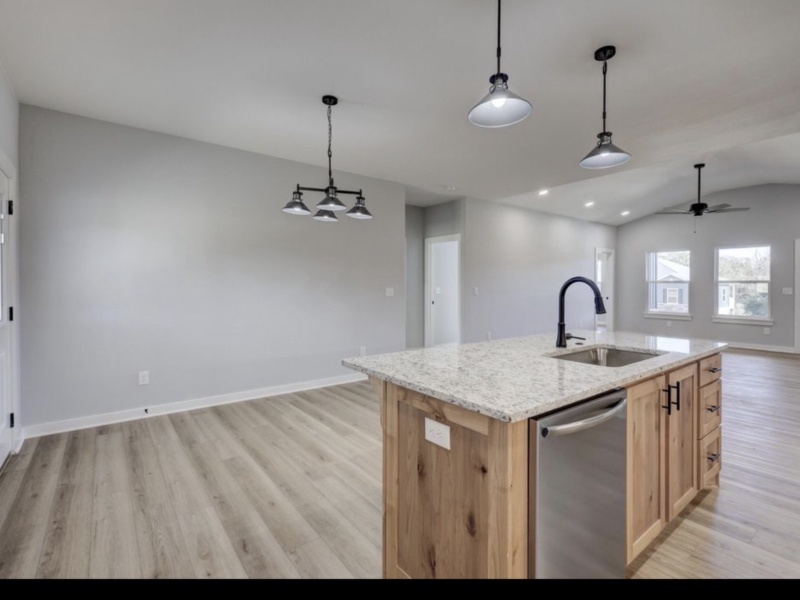 Discover your ideal home with this spacious three-bedroom, two-bathroom property, perfectly designed for modern family living. The open floor plan seamlessly blends the living, dining, and kitchen areas, creating a welcoming environment for entertaining guests and enjoying daily life. Each bedroom offers generous space and natural light, while the master suite provides a private retreat for relaxation. With 1,646 square feet of well-planned living space, this home is an exceptional choice for families seeking comfort, functionality, and style.