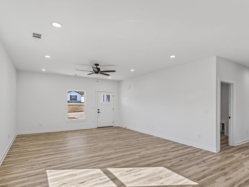 This brand new, move-in ready 3-bedroom, 2-bath home offers modern comfort with a stylish open-concept design. It features a kitchen with granite countertops, a spacious island, stainless steel appliances, and under-cabinet lighting. The two-car garage provides convenience and storage. Located conveniently near Joplin and Northwest Arkansas, it offers quick access to shopping, dining, and employment centers, all while being more affordable. This home is perfect for those seeking value, comfort, and convenience.