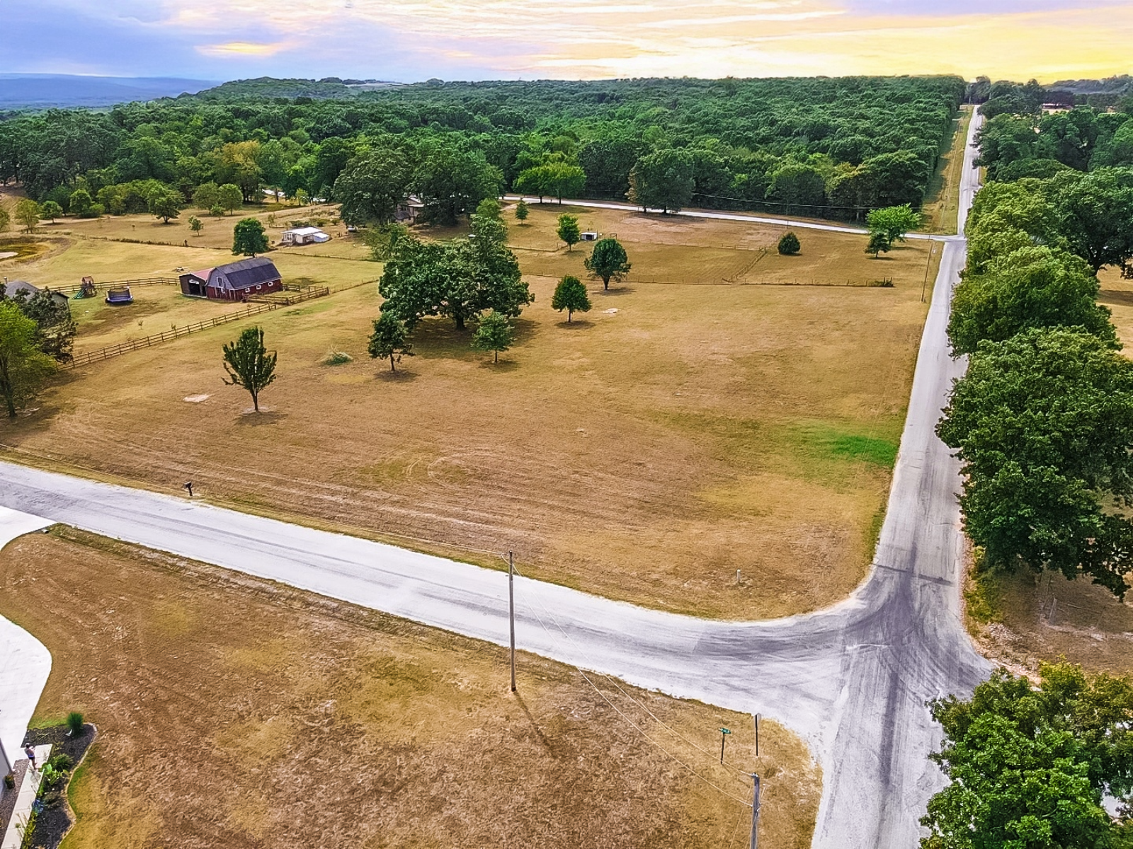 Nestled just outside of town, Saginaw Hills Estates offers the perfect blend of peaceful rural living with easy access to everyday conveniences. This serene neighborhood is minutes from Sam’s Club and the south-side dining scene, and only about five miles from both area hospitals. With quick access to I-49 and Highway 44, commuting is a breeze while you enjoy a tranquil setting ideal for walking, running, or outdoor time. If you’re seeking a quiet, countryside lifestyle without sacrificing town amenities, Saginaw Hills Estates is the ideal choice—beautiful, peaceful, and conveniently close to everything you need.