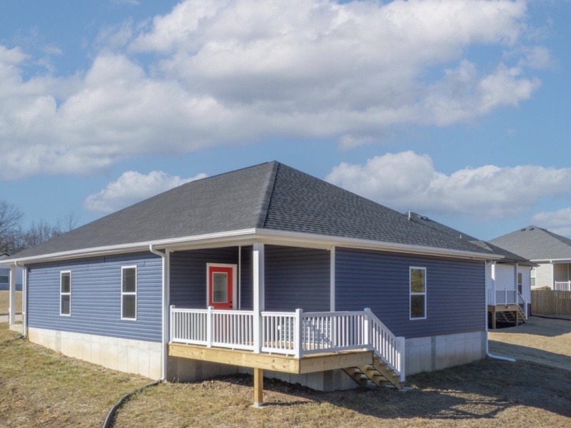This brand new, move-in ready 3-bedroom, 2-bath home offers modern comfort with a stylish open-concept design. It features a kitchen with granite countertops, a spacious island, stainless steel appliances, and under-cabinet lighting. The two-car garage provides convenience and storage. Located conveniently near Joplin and Northwest Arkansas, it offers quick access to shopping, dining, and employment centers, all while being more affordable. This home is perfect for those seeking value, comfort, and convenience.