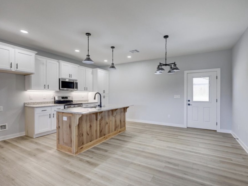 Discover your ideal home with this spacious three-bedroom, two-bathroom property, perfectly designed for modern family living. The open floor plan seamlessly blends the living, dining, and kitchen areas, creating a welcoming environment for entertaining guests and enjoying daily life. Each bedroom offers generous space and natural light, while the master suite provides a private retreat for relaxation. With 1,646 square feet of well-planned living space, this home is an exceptional choice for families seeking comfort, functionality, and style.