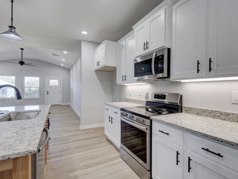 Discover your ideal home with this spacious three-bedroom, two-bathroom property, perfectly designed for modern family living. The open floor plan seamlessly blends the living, dining, and kitchen areas, creating a welcoming environment for entertaining guests and enjoying daily life. Each bedroom offers generous space and natural light, while the master suite provides a private retreat for relaxation. With 1,646 square feet of well-planned living space, this home is an exceptional choice for families seeking comfort, functionality, and style.